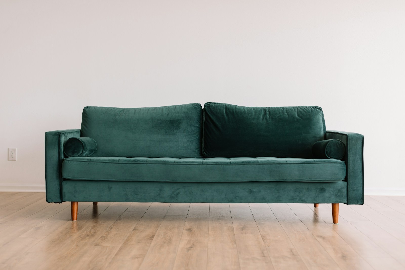 A living room with an 84-inch sofa, used to show prints at true scale